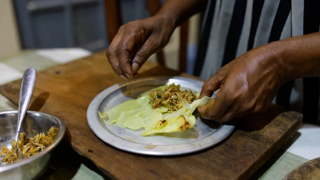 cabbage leaves filled with coriander-spiced rice and chicken